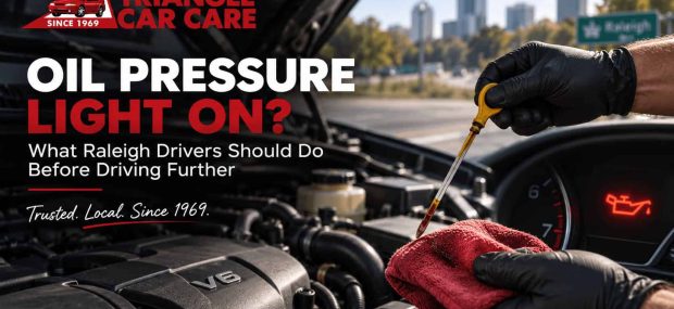 Oil pressure light warning with engine oil dipstick check for Raleigh drivers at Triangle Car Care.